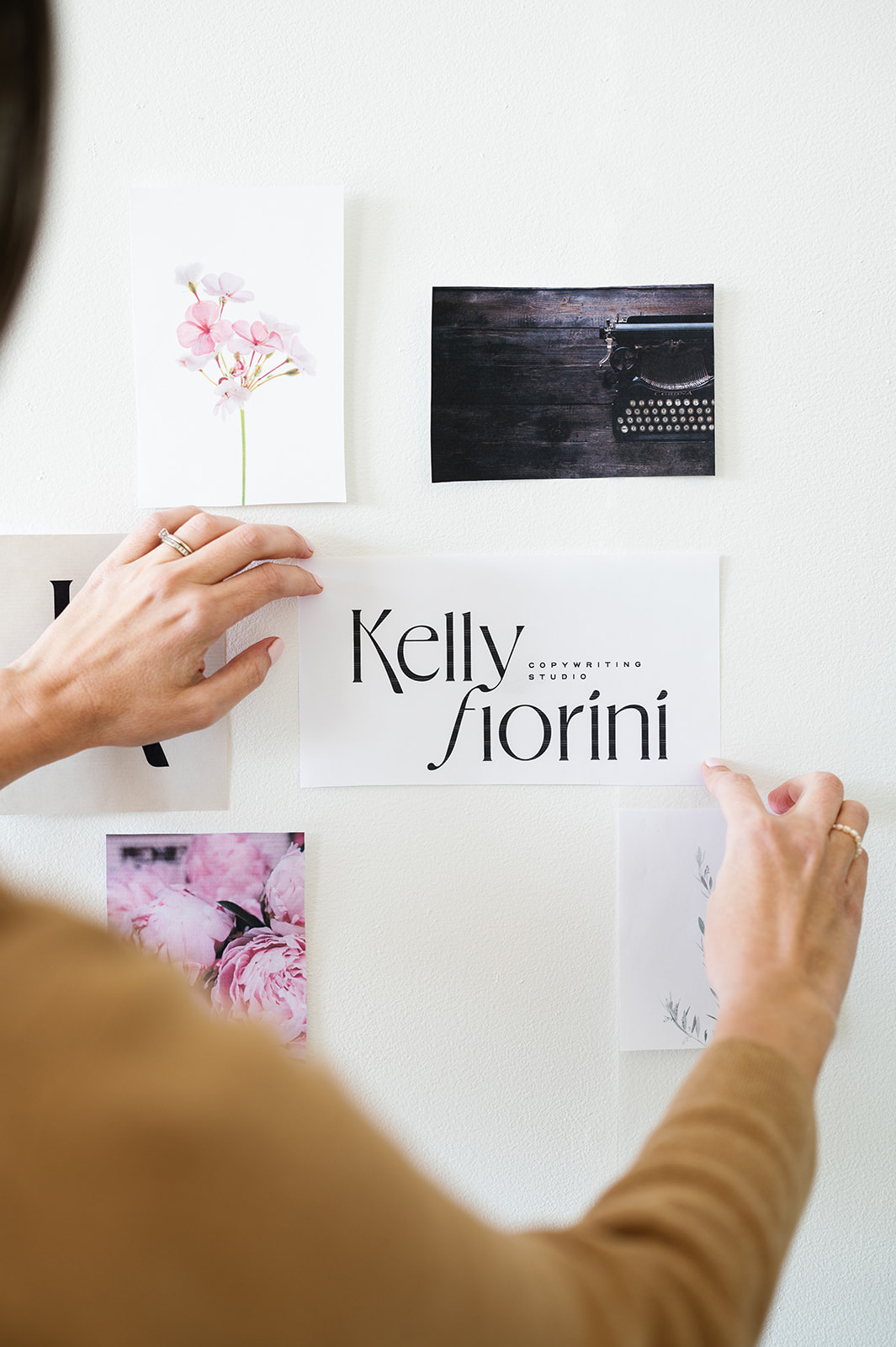 Kelly Fiorini puts brand photos on the wall